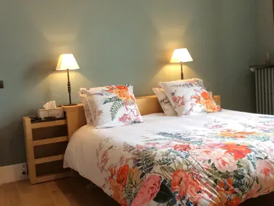 Un ou plusieurs lits dans un hébergement de l'établissement La Lambertine & Spa