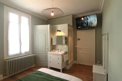 Un ou plusieurs lits dans un hébergement de l'établissement La Lambertine & Spa