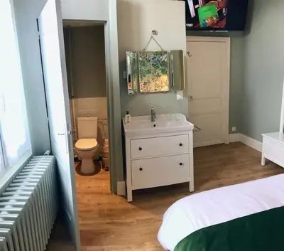 Un ou plusieurs lits dans un hébergement de l'établissement La Lambertine & Spa