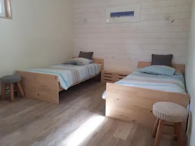 Un ou plusieurs lits dans un hébergement de l'établissement Gîte de la Rotterie
