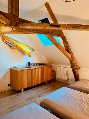 Un ou plusieurs lits dans un hébergement de l'établissement Maison 1440 - SPIRIT, logement Atypique Sport Auto