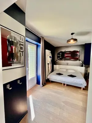 Un ou plusieurs lits dans un hébergement de l'établissement Maison 1440 - SPIRIT, logement Atypique Sport Auto