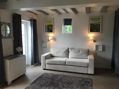 Coin salon dans l'établissement Les Vallées