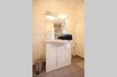 Cuisine ou kitchenette dans l'établissement La Maison Tourangelle