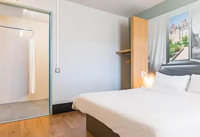 Un ou plusieurs lits dans un hébergement de l'établissement B&B HOTEL TOURS Sud Joué-lès-Tours