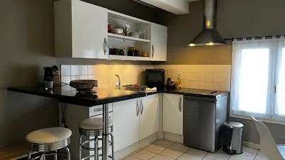 Cuisine ou kitchenette dans l'établissement Le 24 Clemenceau