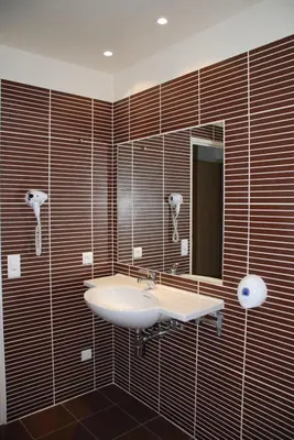 Salle de bains dans l'établissement Cit'Hotel Criden