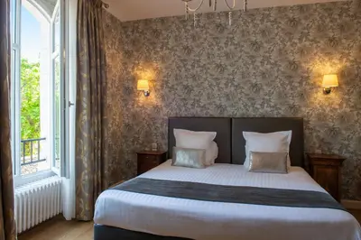 Un ou plusieurs lits dans un hébergement de l'établissement Le Relais Des Landes - Demeures et Chateaux