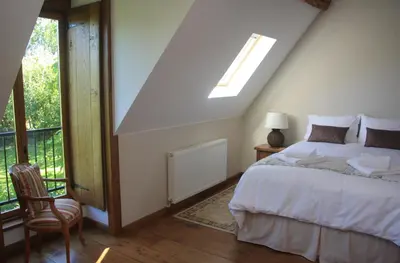 Un ou plusieurs lits dans un hébergement de l'établissement Les Bouts de Rallé Chambre d'Hotes