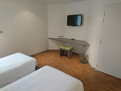 Télévision ou salle de divertissement dans l'établissement H24 HOTEL
