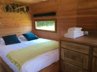 Un ou plusieurs lits dans un hébergement de l'établissement Ecolodges de Loire & Spa
