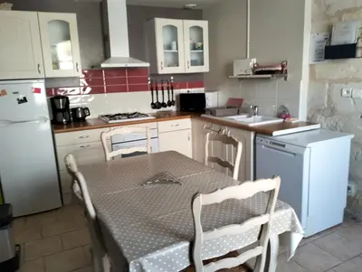 Cuisine ou kitchenette dans l'établissement Le Gîte des Marguerites