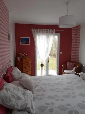Un ou plusieurs lits dans un hébergement de l'établissement Chambre d'hôtes du Haut Chemin