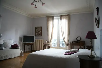 Un ou plusieurs lits dans un hébergement de l'établissement Chambres d'hôtes Le Clos d'Hauteville
