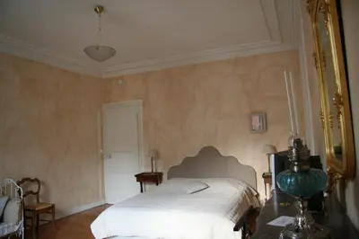 Un ou plusieurs lits dans un hébergement de l'établissement Chambres d'hôtes Le Clos d'Hauteville