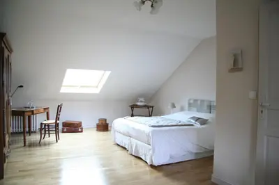 Un ou plusieurs lits dans un hébergement de l'établissement Chambres d'hôtes Le Clos d'Hauteville