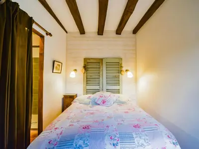 Un ou plusieurs lits dans un hébergement de l'établissement Holiday Home Le Pigeonnier by Interhome