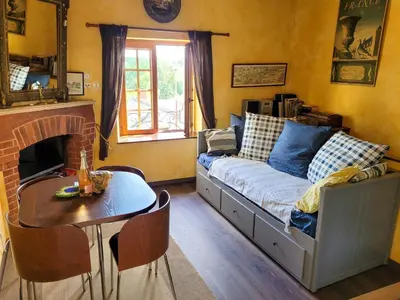 Coin salon dans l'établissement Holiday Home Le Pigeonnier by Interhome