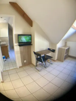 Télévision ou salle de divertissement dans l'établissement Beauval Chambre