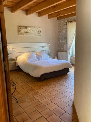 Un ou plusieurs lits dans un hébergement de l'établissement Logis Auberge de Crissay