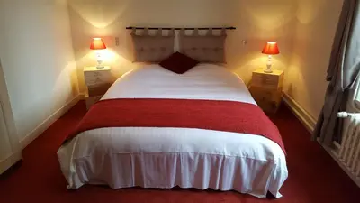 Un ou plusieurs lits dans un hébergement de l'établissement Moulin De Bacchus - Châteaux de la Loire