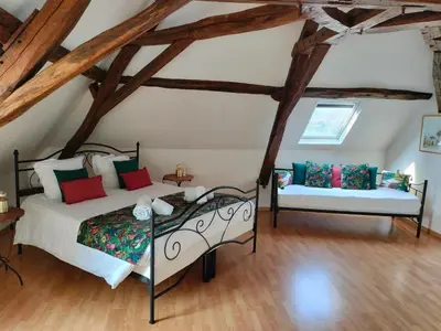 Un ou plusieurs lits dans un hébergement de l'établissement Moulin De Bacchus - Châteaux de la Loire