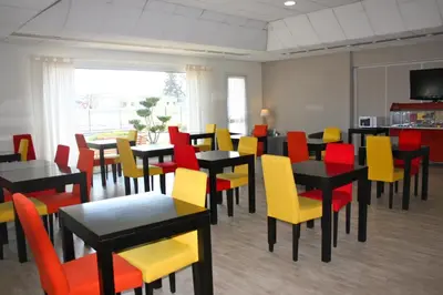 Télévision ou salle de divertissement dans l'établissement Fasthotel Vendome