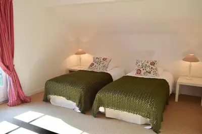 Un ou plusieurs lits dans un hébergement de l'établissement Cottages de Château de Vaux