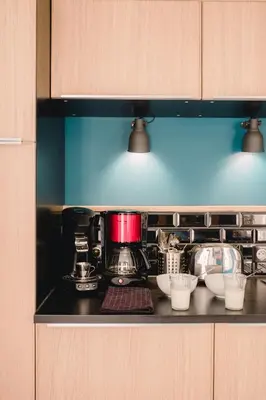 Cuisine ou kitchenette dans l'établissement Hôtel Saint Pierre Boutique-Hôtel