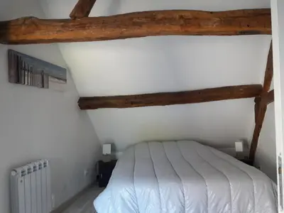 Un ou plusieurs lits dans un hébergement de l'établissement Maison De Charme