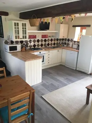 Cuisine ou kitchenette dans l'établissement Les Coindries