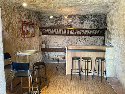 Coin salon dans l'établissement La maison des caves
