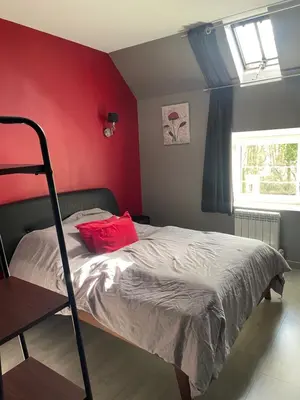 Un ou plusieurs lits dans un hébergement de l'établissement La maison des caves