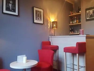 Coin salon dans l'établissement Hotel Mirabeau