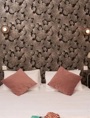 Un ou plusieurs lits dans un hébergement de l'établissement Hotel Mirabeau