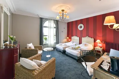 Un ou plusieurs lits dans un hébergement de l'établissement Logis Hôtel Restaurant Cristal
