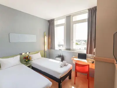 Un ou plusieurs lits dans un hébergement de l'établissement ibis budget Le Mans Centre