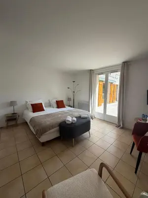 Un ou plusieurs lits dans un hébergement de l'établissement Golf Hotel de la Carte