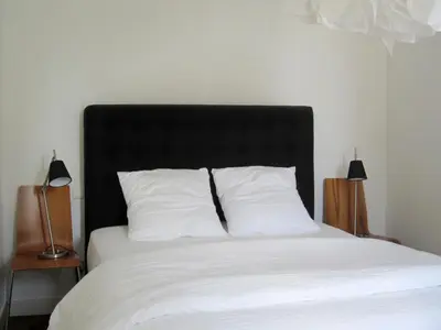 Un ou plusieurs lits dans un hébergement de l'établissement L appartement des bords du Cher