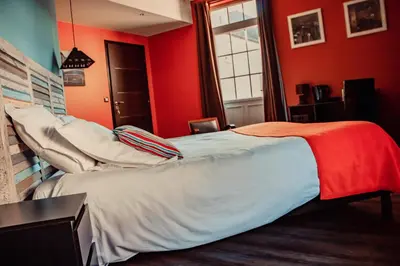 Un ou plusieurs lits dans un hébergement de l'établissement chambres d'hotes saint hubert