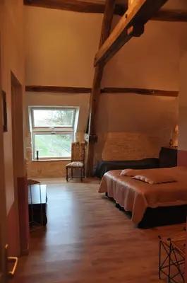 Un ou plusieurs lits dans un hébergement de l'établissement Les Pierres D'aurèle Chambres d'Hôtes