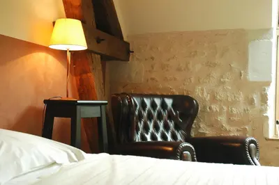 Un ou plusieurs lits dans un hébergement de l'établissement Les Pierres D'aurèle Chambres d'Hôtes