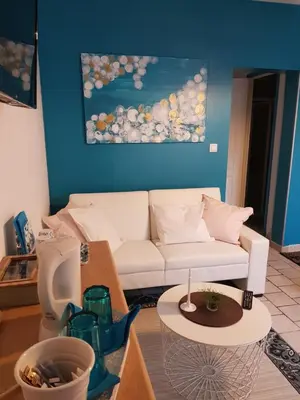 Coin salon dans l'établissement Ideal pour une pause