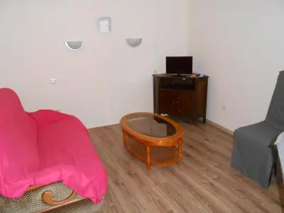 Télévision ou salle de divertissement dans l'établissement Appartement