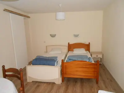 Un ou plusieurs lits dans un hébergement de l'établissement Appartement