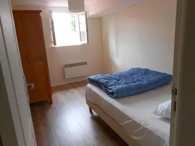 Un ou plusieurs lits dans un hébergement de l'établissement Appartement