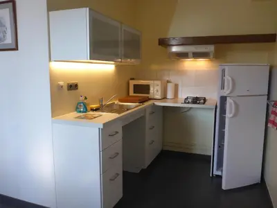 Cuisine ou kitchenette dans l'établissement Le Buisson