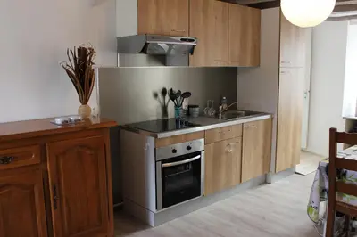 Cuisine ou kitchenette dans l'établissement Un petit coin de paradis
