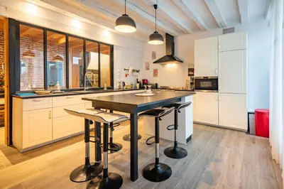 Cuisine ou kitchenette dans l'établissement Gîte Jeanne D'Arc