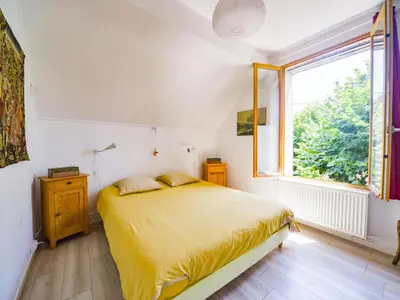 Un ou plusieurs lits dans un hébergement de l'établissement Holiday Home Au Soleil Joyeux by Interhome